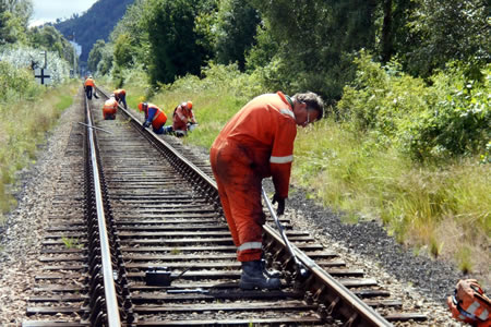 Photograph of p-way squad mainting the railway track